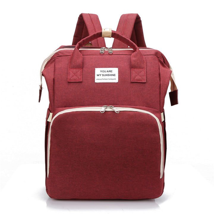 Baby-Windelrucksack mit integriertem Babybett